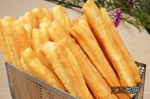 油条炸出来发硬是什么原因？油条硬硬的怎么回事，这才是好文
